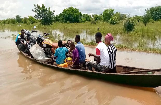 Pregnant Women Access Health Care With Canoe After Downpour