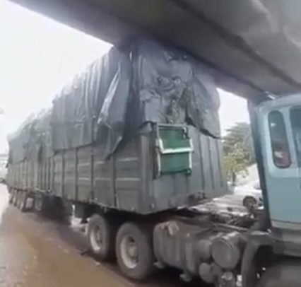Overloaded Truck Creates Scene