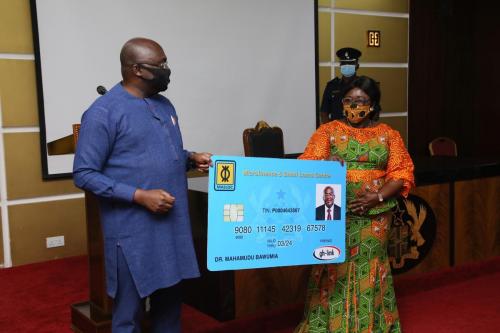 1. Vice-President Dr Mahamudu  Bawumia and Mrs  Akosua Osei Opare, Chief of Staff launching the MASLOC  Integrated ICT System at the Jubilee House in Accra.