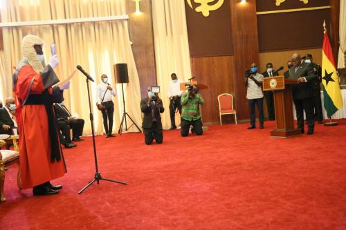 17.  President Nana Addo Dankwa Akufo-Addo (right), Justice Yonny Kulendi (left)