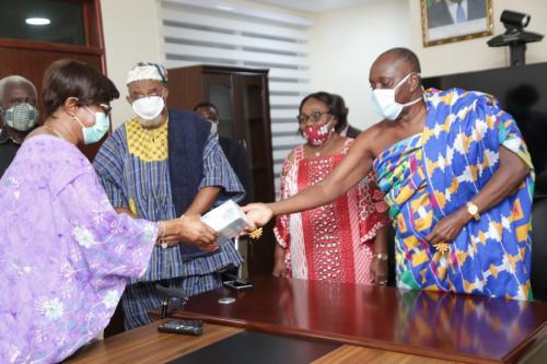 2  Justice Sophia Akuffo (left),   Chairperson, National COVID-19 Trust Fund receiving cash from Nana Otuo   Sriboe (right), Chairman, Council of State (1)